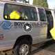 Boys & Girls Clubs Staff load toy drive yellow bags into van