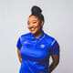 Regence Volunteer Janessa Henry poses in a blue Nike t-shirt for her profile picture.