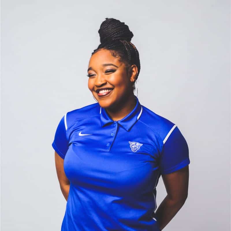 Janessa Henry Regence Volunteer Janessa Henry poses in a blue Nike t-shirt for her profile picture.